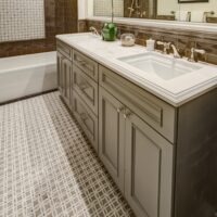 Brown Shower Tile and Bathroom Cabinets
