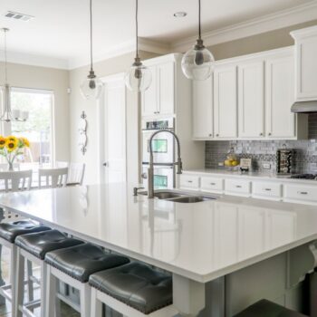 White Kitchen Cabinets and Gray Tile Kitchen Backsplash